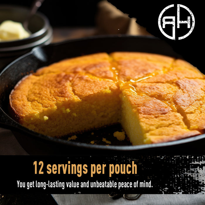 Cornbread in a skillet with a slice missing